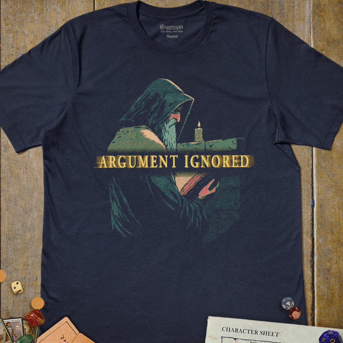 Navy graphic T-shirt with a hooded sage reading by candlelight illustration and "Argument Ignored" text