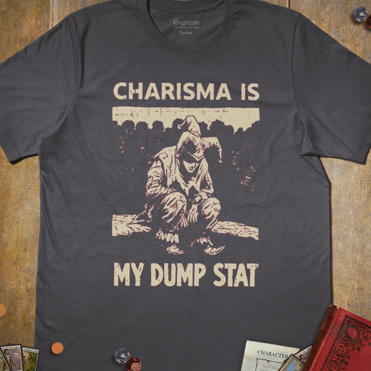 Charcoal tabletop RPG T-shirt with a hooded figure illustration and Charisma Is My Dump Stat text