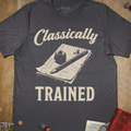 Charcoal gray tabletop RPG T-shirt with a quill and parchment and classically trained text