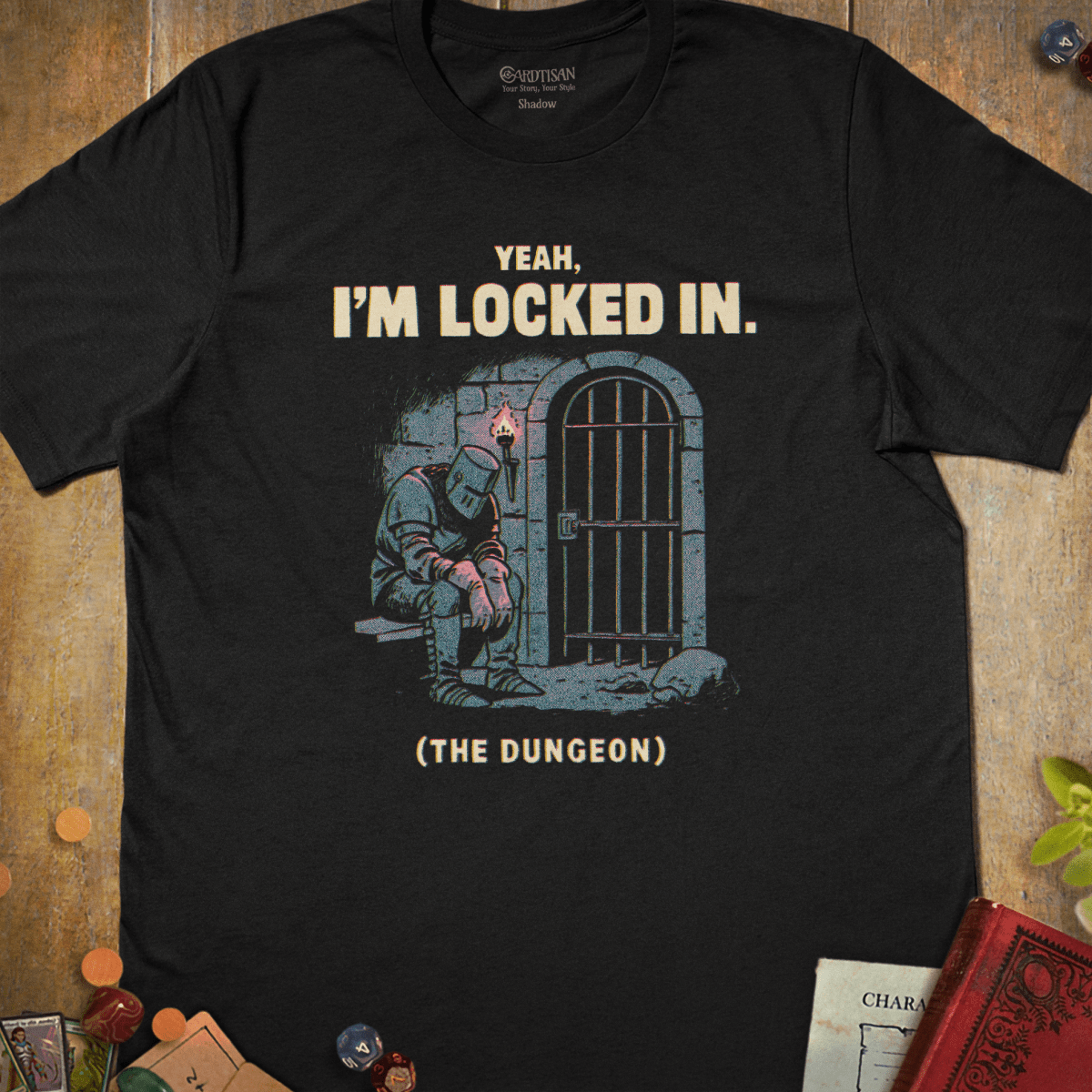Black dungeon fantasy T-shirt with an armored knight beside a prison cell door and yeah I’m locked in the dungeon text