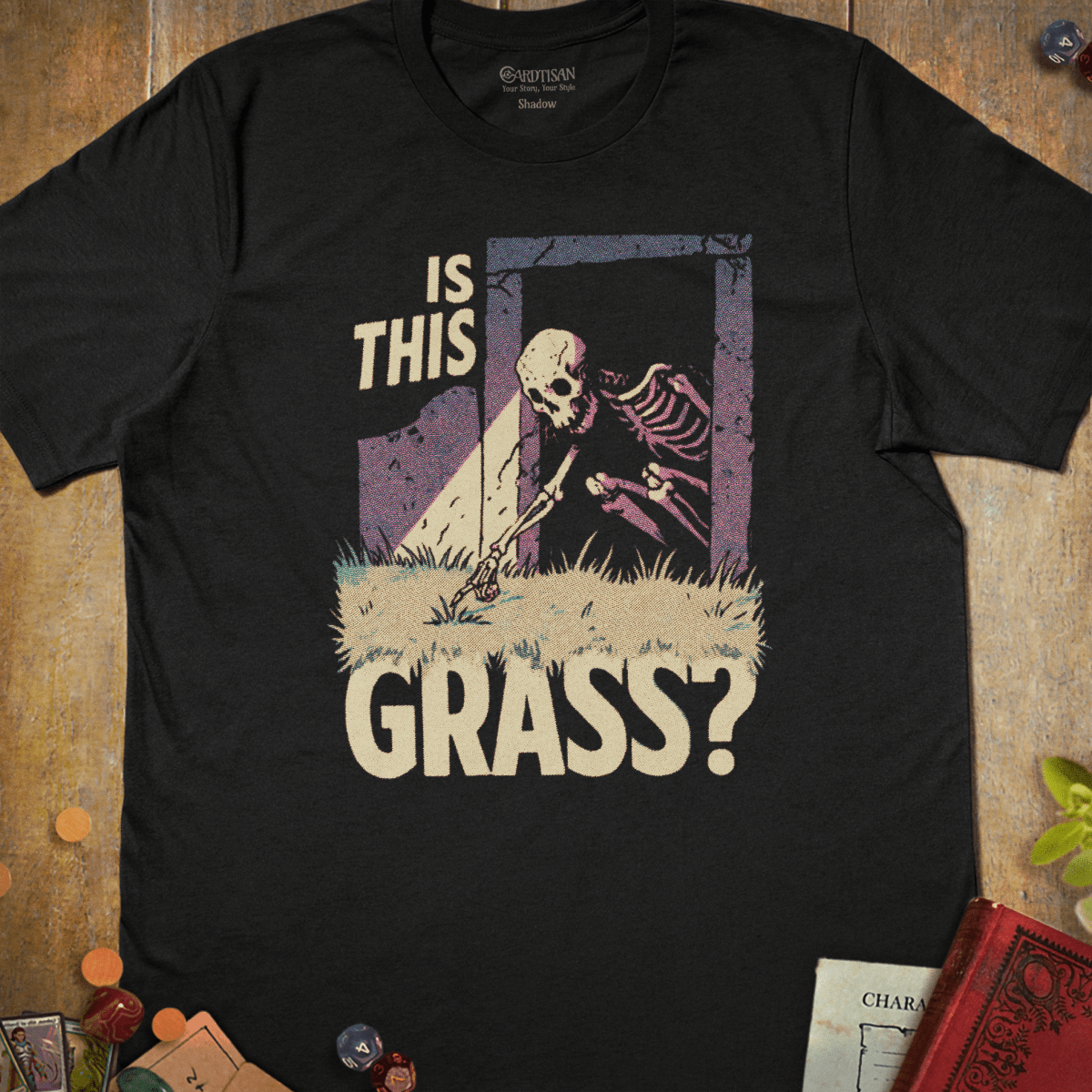 Black fantasy T-shirt with a skeleton crawling out of a dungeon doorway to touch grass and Is This Grass? text