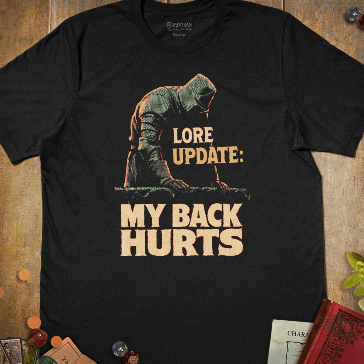 Black tabletop RPG T-shirt with a hooded rogue leaning on a railing and Lore Update My Back Hurts text