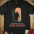 Black fantasy T-shirt with a silhouetted warrior in a glowing doorway and weekends are for saving the realm text