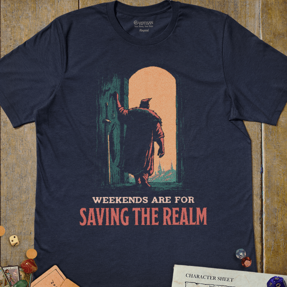 Navy graphic T-shirt with a cloaked adventurer stepping through a glowing doorway illustration and "Weekends Are For Saving the Realm" text