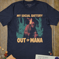 Navy tabletop RPG T-shirt with a hooded wanderer holding a torch and My Social Battery Is Out of Mana text