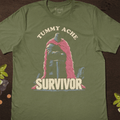 Tummy Ache Survivor T-Shirt - Cardtisan - T-Shirt - Sage - S - absurd-humor - dark-humor